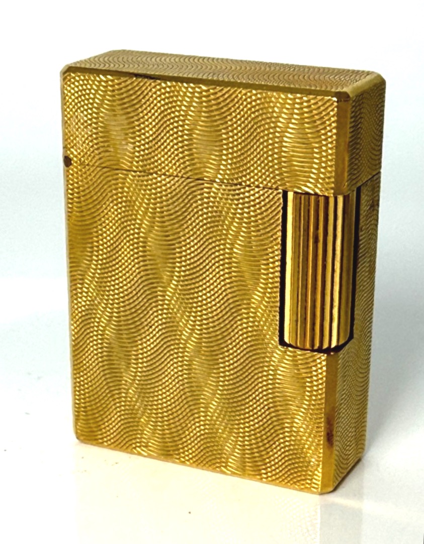 Briquet plaqué or par Dupont pour Hermès