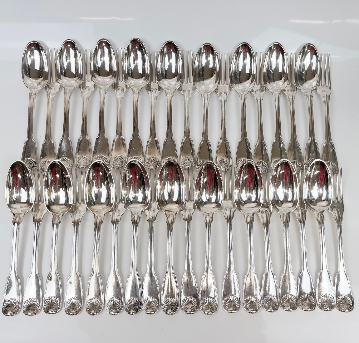 A Set Of 18 Pieces Of Solid Silver Tableware From The 18th Century