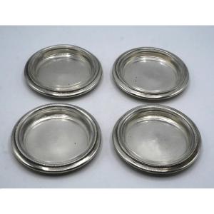 Suite de 4 beurriers en argent massif