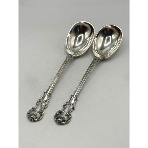 Paire de cuillères de service en argent massif par Queillé