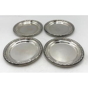 Suite de 4 dessous de bouteille en argent massif par Boin Georges et Henry/Boin Taburet