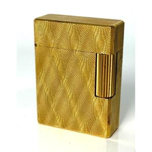 Briquet plaqué or par Dupont pour Hermès