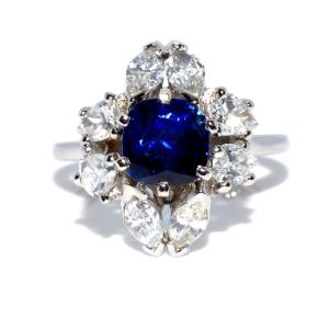 Bague entourage en saphir et diamants