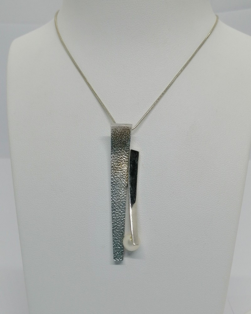 Silver Pendant With Hammered Motif And Cultured Pearl, And Chain, Signed Daniel Vior, Barcelona.