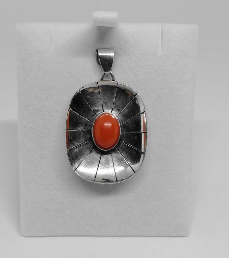 Silver Pendant, Openwork And Closed Setting With A Coral Cabochon.