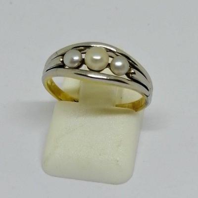 Gold And Platinum Ring With Fine Pearls.