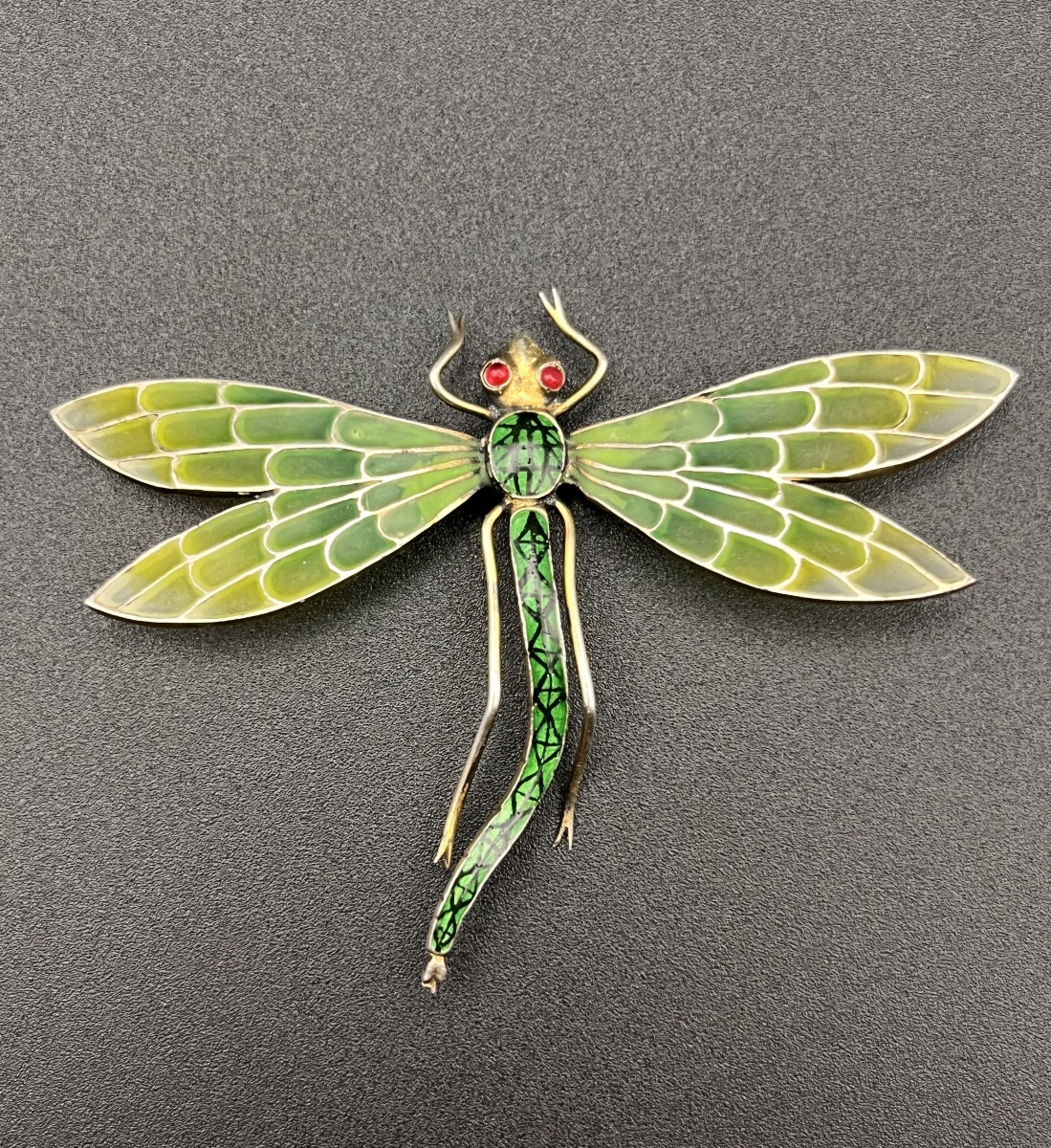 Pendentif libellule en argent 900 millièmes.