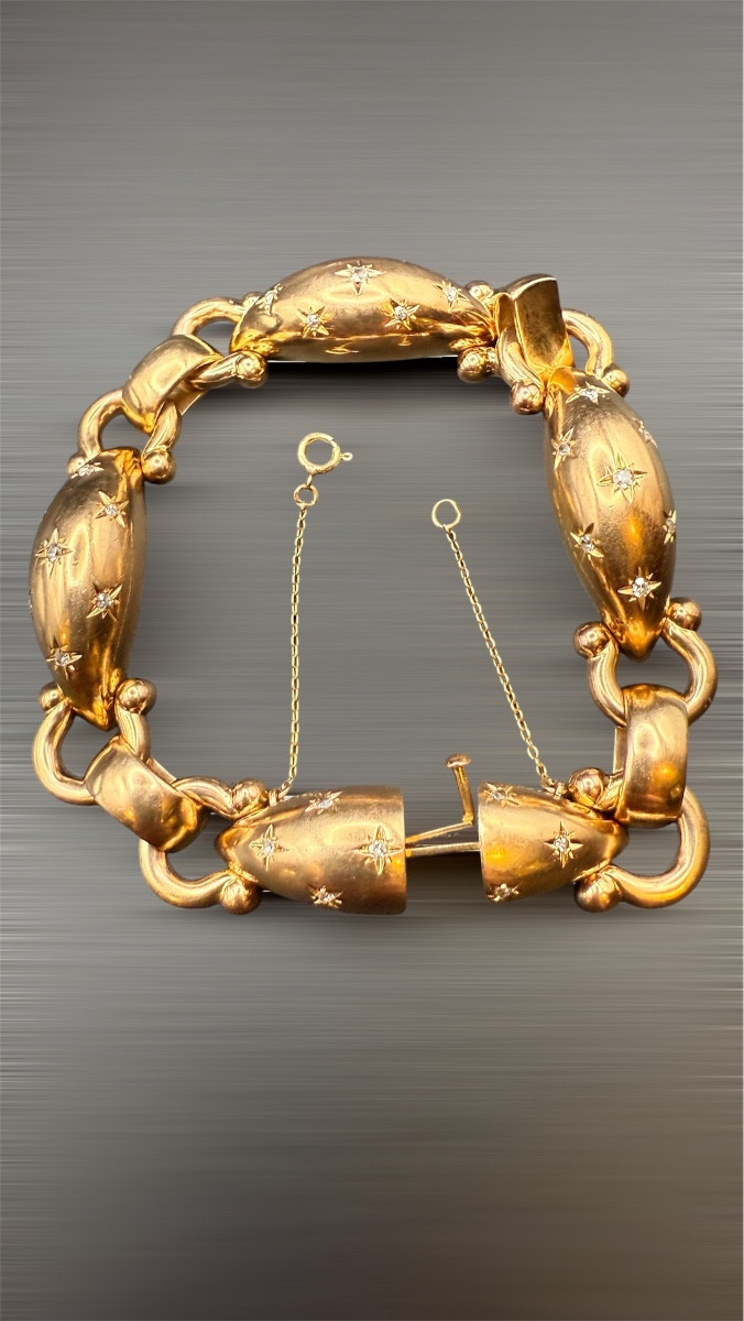 Bracelet en or jaune 18 carats, vers 1950.