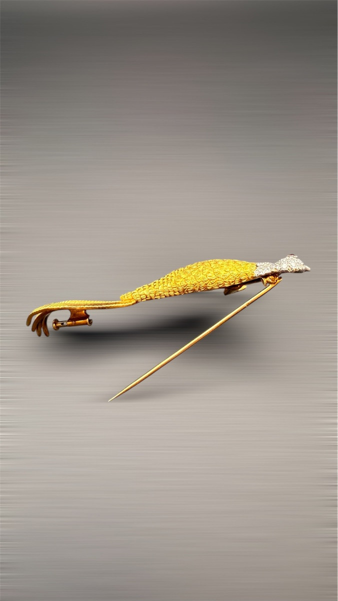 Broche oiseau en or 18 carats-photo-4