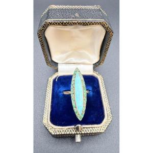 18-karat Yellow Gold Marquise Ring With Opal And Emeralds.