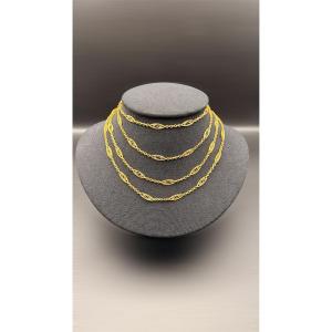Sautoir Art Nouveau en or jaune 18 carats.