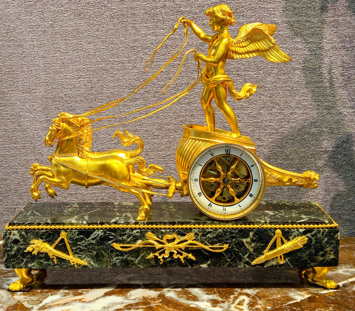 Pendule Empire en bronze doré - Cupidon au char- modèle de Ravrio