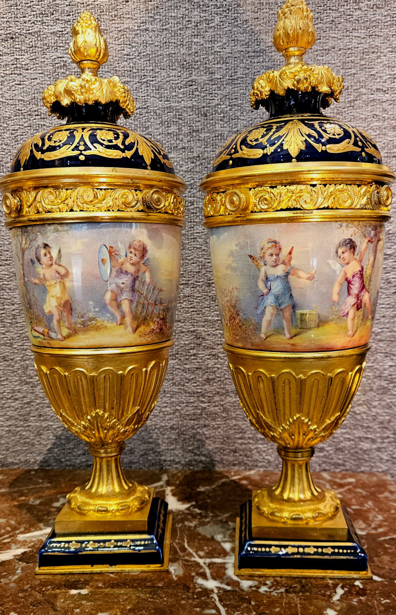 Pair Of Sèvres Vases Mounted In Gilded Bronzes