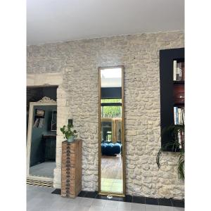 Miroir ancien 228cm/47cm d’entre-deux époque début 20ème, glace biseautée et piquée, parqueté.