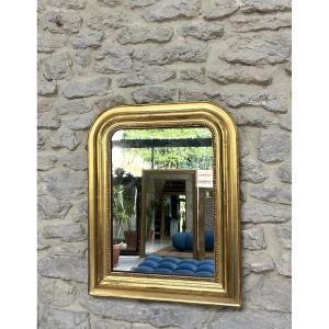 Miroir ancien Louis-Philippe perlé 56,5/44cm doré à la feuille d’or, glace mercure, trumeau.