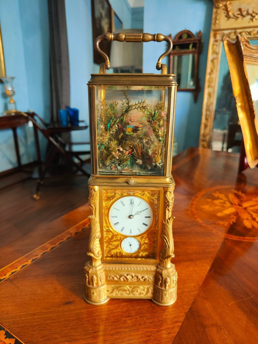 Important And Rare Clock With Bird And Automaton.