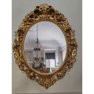 Grand miroir du XIXe siècle à décor de cartouches, avec dorure d'origine en parfait état