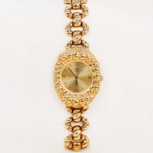 BALENCIAGA Montre vintage or jaune