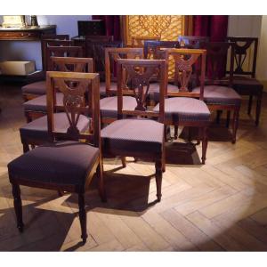 Suite de 15 chaises d'époque Empire provenant du Sénat, début XIXe