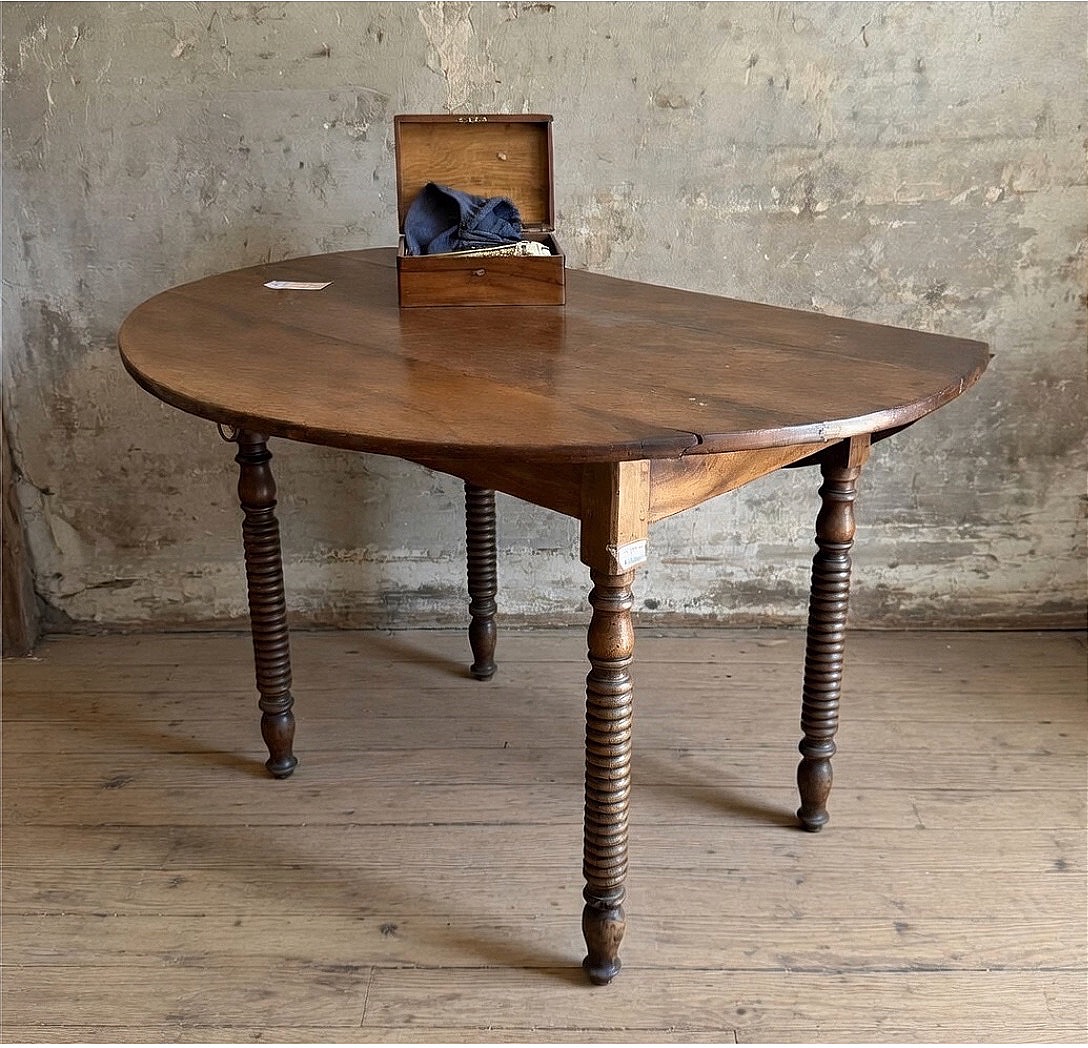 Oval Slatted Table Made Of Walnut, Dating From The Late 19th Century.