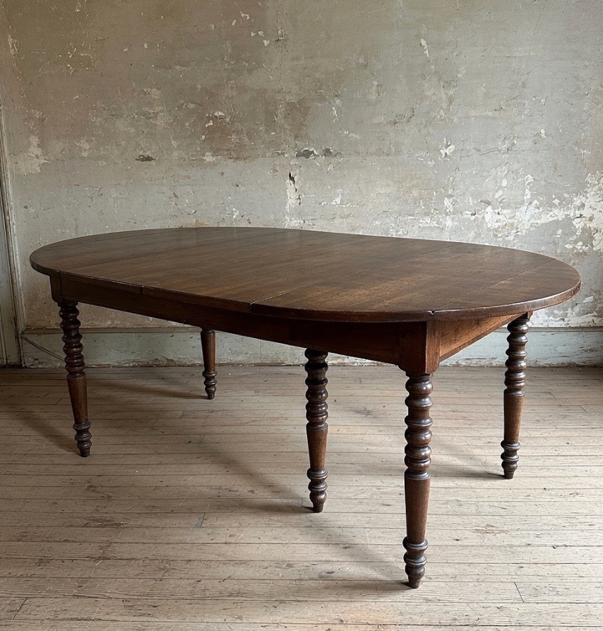 Table à abattants en noyer massif datant du début du XIXᵉ siècle