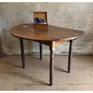 Oval Drop-leaf Table In Walnut, Dating From The Late 19th Century.