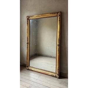 19th Century French Mirror, Crafted In Finely Carved Wood And gilded With Gold And Gold Leaf.