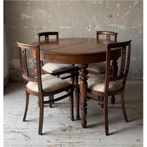Extendable Round Table With Original Extension Leaves And Four Matching Chairs.