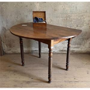 Oval Slatted Table Made Of Walnut, Dating From The Late 19th Century.