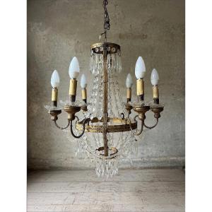 Lustre à pampilles en cristal à six lumières, daté du milieu du XIXᵉ siècle.