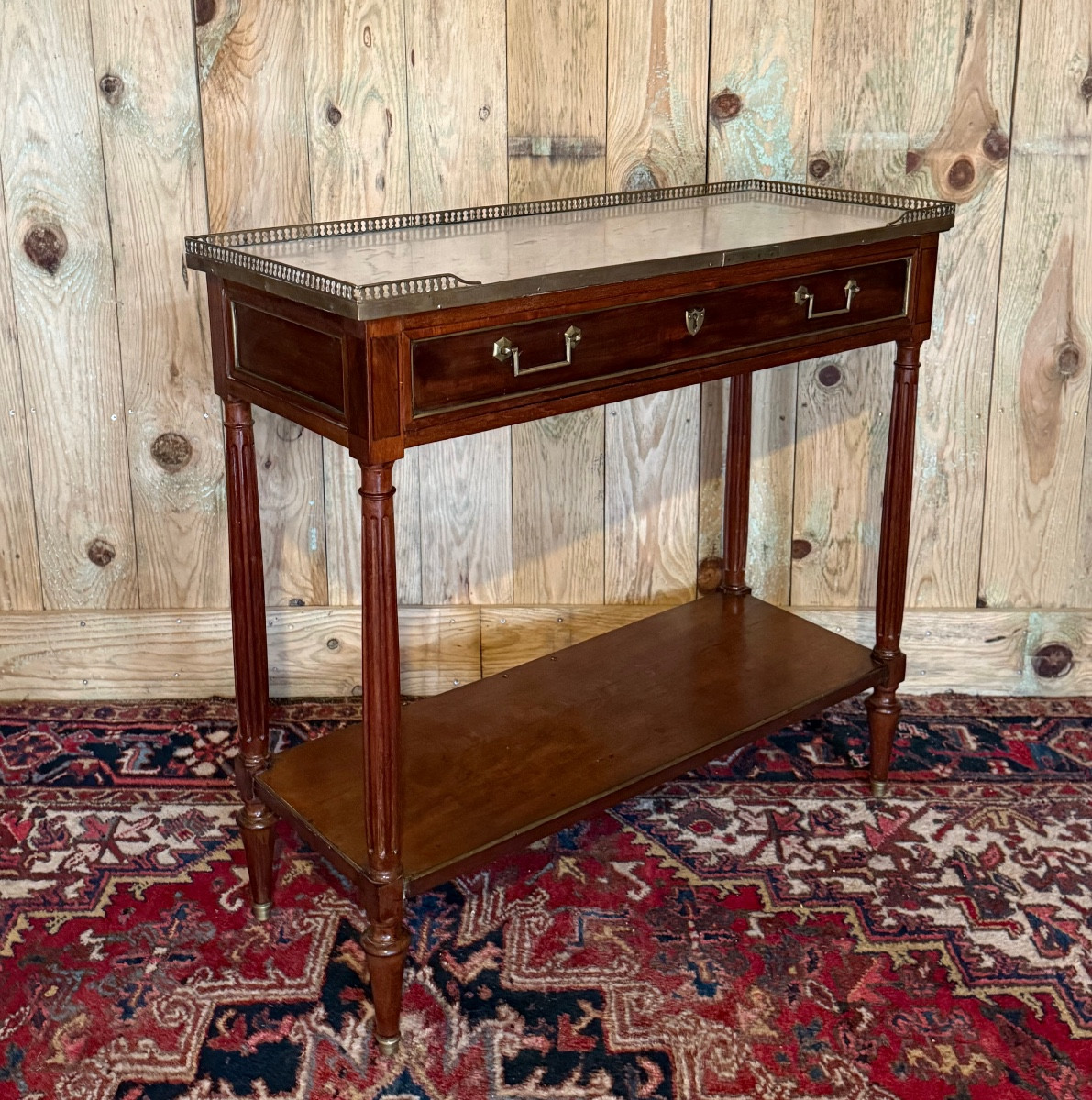 Console de style Louis XVI en acajou. 
