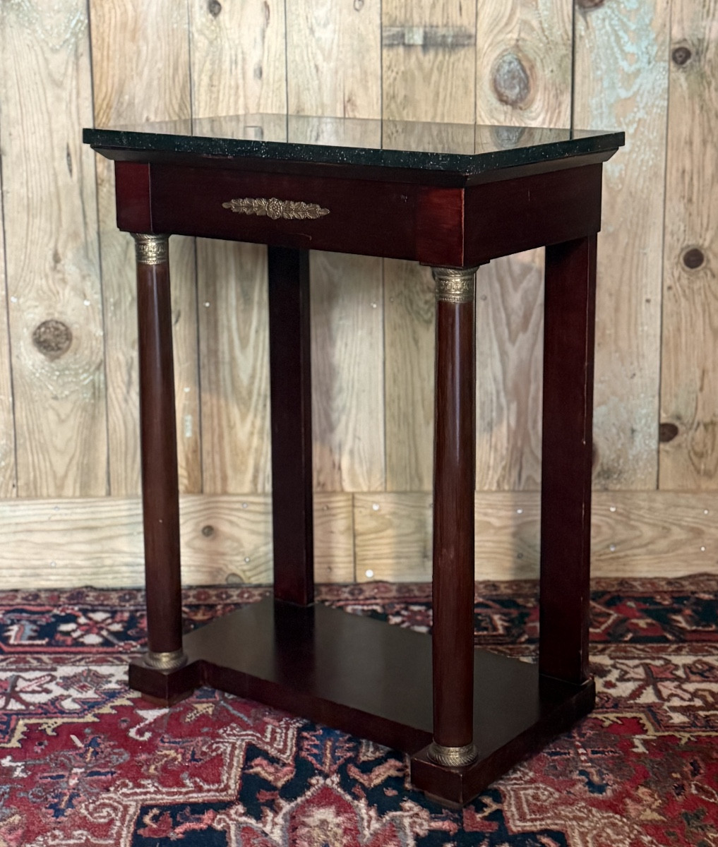 Console de style Empire en acajou. 