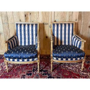 Pair Of Louis XVI Style Bergere Chairs In Gilded Wood.