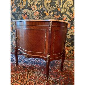 A Chest Of Drawers In Marquetry.