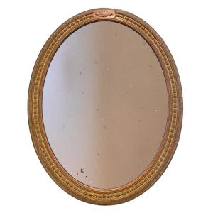 Miroir ovale anglais du XIXe siècle en bois doré avec verre mercurisé d'origine