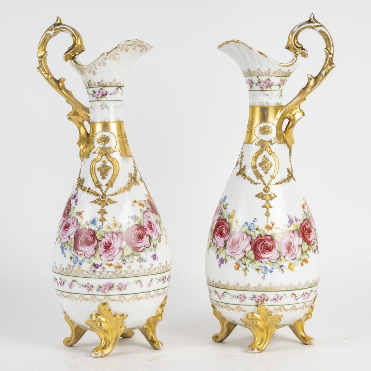 Pair Of Paris Porcelain Ewers With Floral Decor And Gilding