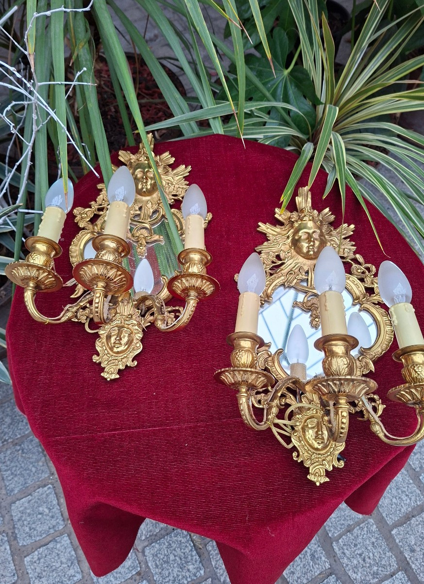 Paire d'appliques miroir en bronze doré