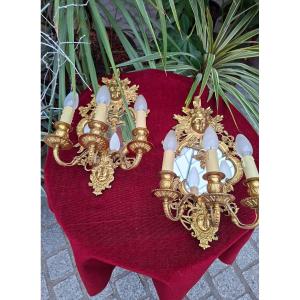 Paire d'appliques miroir en bronze doré