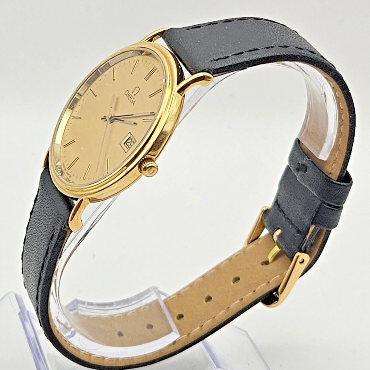 Omega Seamaster 33 mm, quartz, cadran champagne, bracelet cuir, or massif 18 carats, vers 1990-photo-4