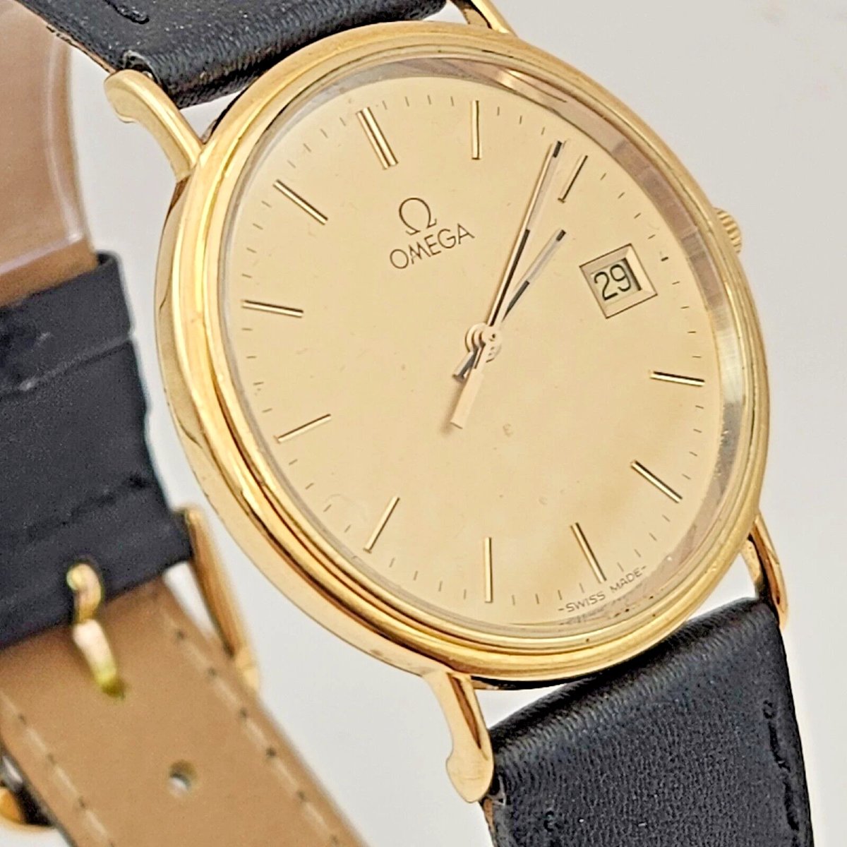 Omega Seamaster 33 mm, quartz, cadran champagne, bracelet cuir, or massif 18 carats, vers 1990-photo-1