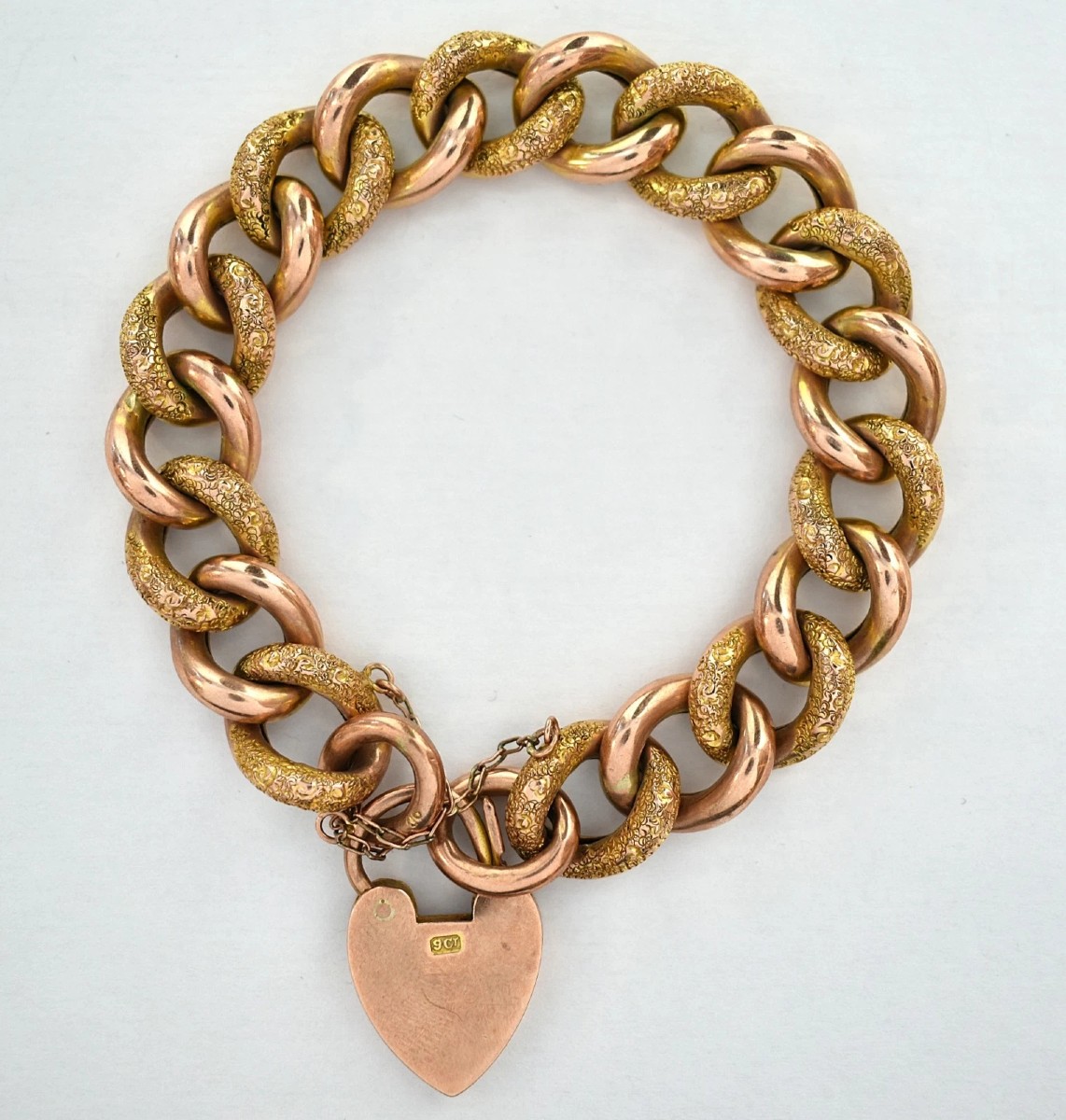 9ct Rose Gold Hollow Engraved Curb Bracelet Heart Padlock - 22.9g