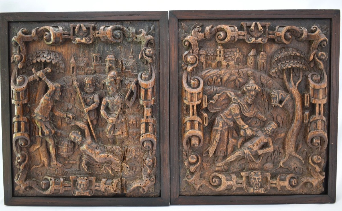 Paire de panneaux anciens en chêne sculpté en relief, d'inspiration flamande (XVIe/XVIIe siècle