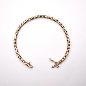 Bracelet tennis en or jaune 18 carats, serti de diamants (1,00 ct), 13,7 g, fermoir invisible