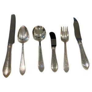 Ménagère Tiffany en argent massif 79 pièces, motif Faneuil, style Art déco