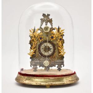 Pendule miniature autrichienne de style Biedermeier, dite « Zappler », en argent, sous globe en