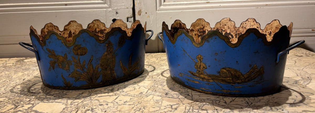 Pair Of Coolers In Sheet Metal Painted Chinese Gold On A Blue Background