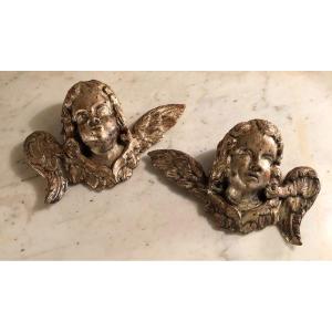 Pair Of Angel Heads In Carved And Gilded Wood
