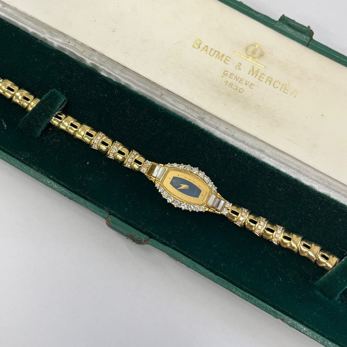 Montre Baume & Mercier en or jaune 18 carats avec diamants – Chronomètre vintage rare