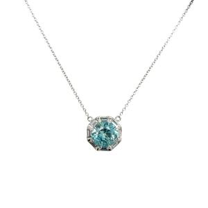 Pendant In 18-carat White Gold With Blue Topaz And Diamonds