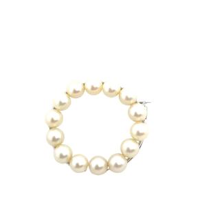 Broche circulaire en perles cultivées sertie en argent